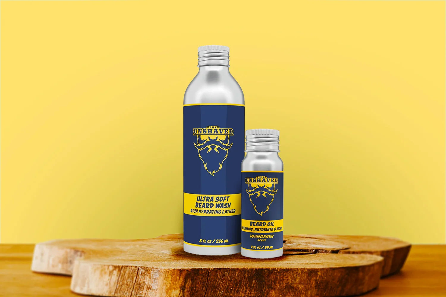 Beard wash and beard oil bottles with blue and yellow labels on wood, yellow background